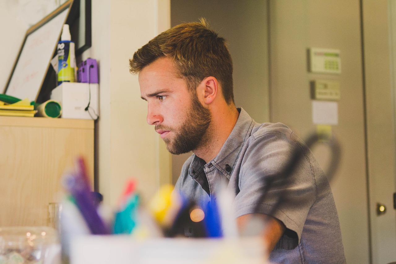 Man, work, desk — How to Find Functional Lab Furniture that Looks Great
